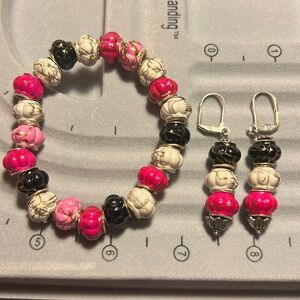 Stretchy bracelet with matching earrings. Pink, white, & black